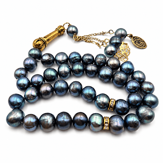 Black Pearl tasbeeh held in hand showing bead size — buy black pearl beads UAE