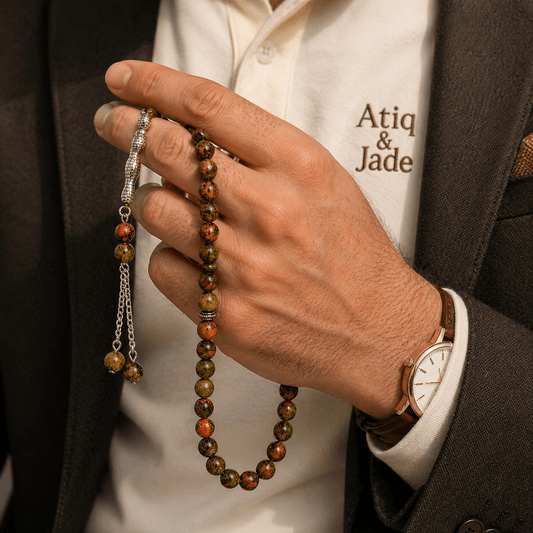 Bloodstone misbaha held in hand showing bead size — buy bloodstone beads UAE