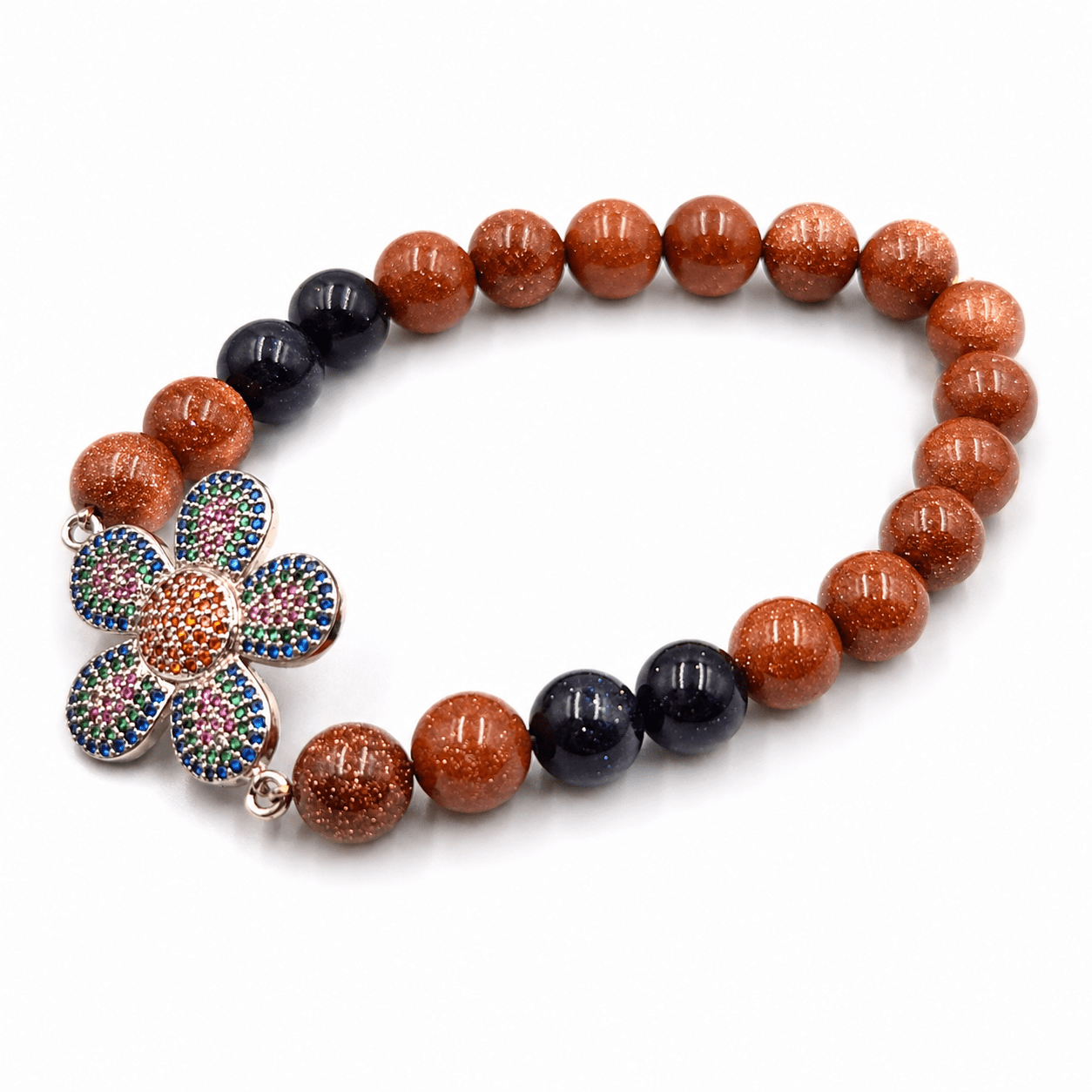 Brown and Dark Goldstone bracelet on a white background — brown and goldstone for ambition