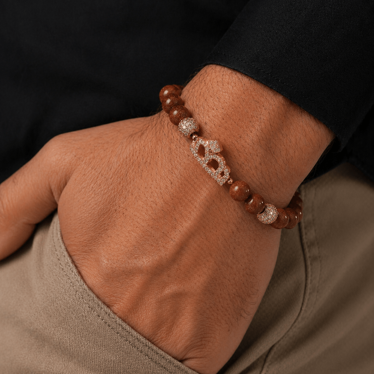Brown Goldstone bracelet, modelled on the wrist — brown goldstone for ambition