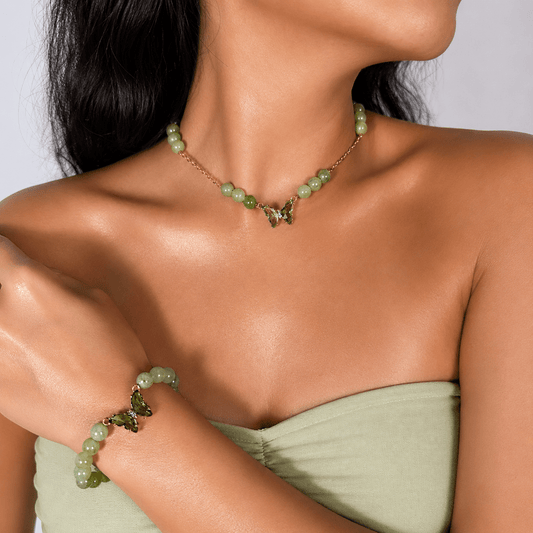 Jade gold-plated silver chain necklace and bracelet set, modelled on the wrist — jade for wisdom