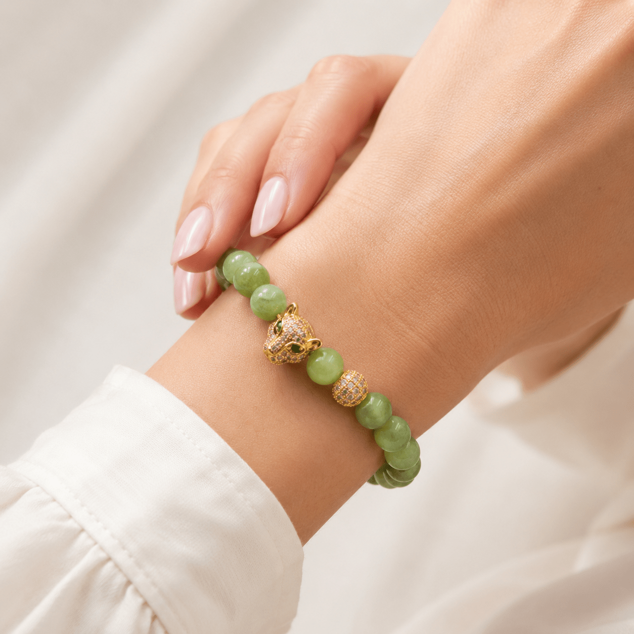 Jade bracelet, worn and shown from above — jade for wisdom