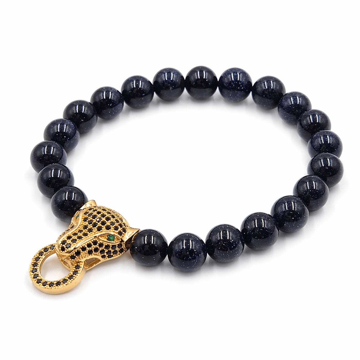 Dark Goldstone bracelet, worn and shown from above — goldstone for ambition