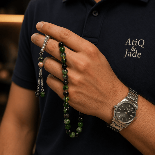 Crystal Emerald sibha held in hand showing bead size — buy crystal emerald beads UAE