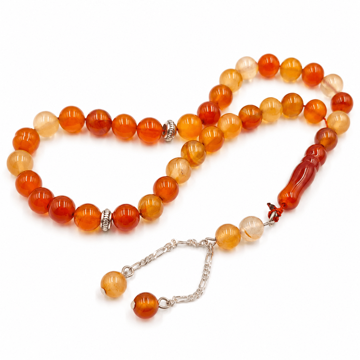 Orange Agate misbaha, the tassel knot and chain link in detail — orange agate for vitality