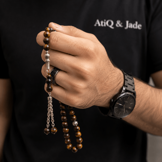 Golden Tiger Eye masbaha held in hand showing bead size — buy golden tiger eye beads UAE