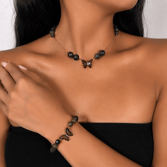 Bloodstone gold-plated silver chain necklace and bracelet set, shown on the wrist — bloodstone for courage
