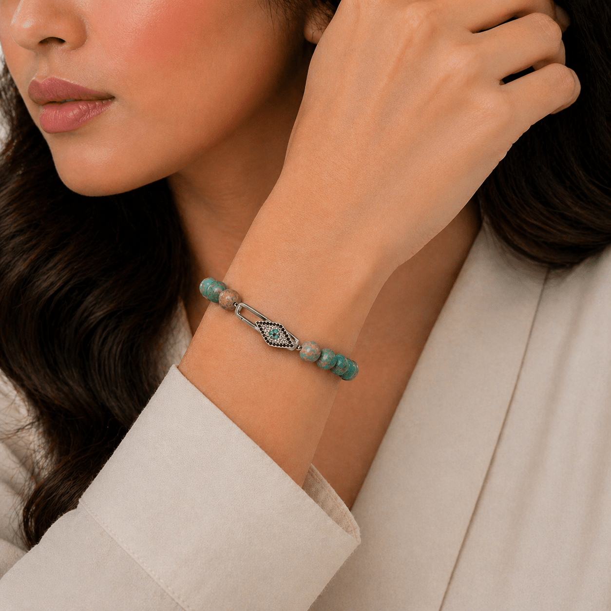 Fairouz Turquoise bracelet, on the wrist against a neutral ground — fairouz turquoise for protection
