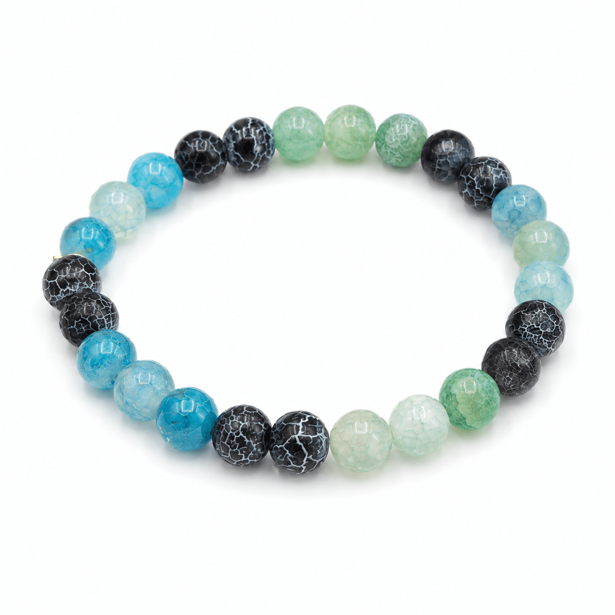 Green Agate bracelet, on the wrist beside the cuff — green agate for peace