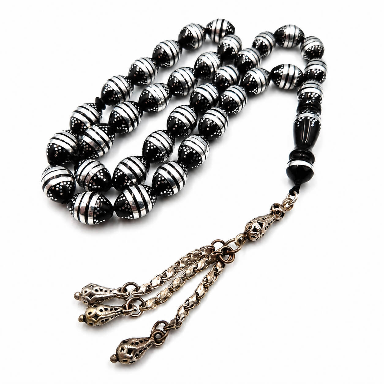 Patterns Kuka misbaha, the tassel against the final bead — kuka beads