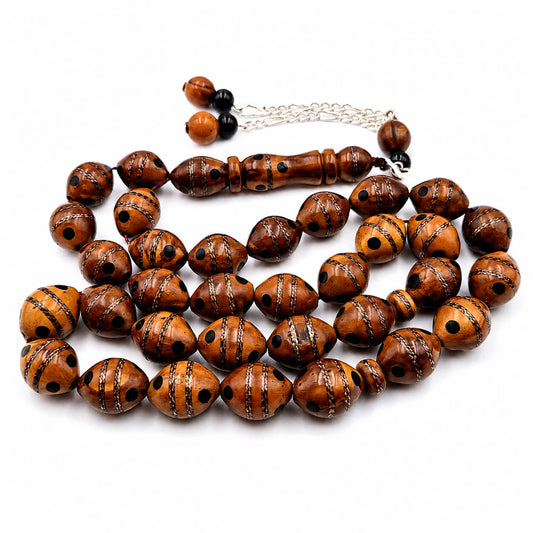 Copper and Yusr Crafted Narjil sibha, close detail of copper and Yusr inlay — buy yusur wood beads UAE