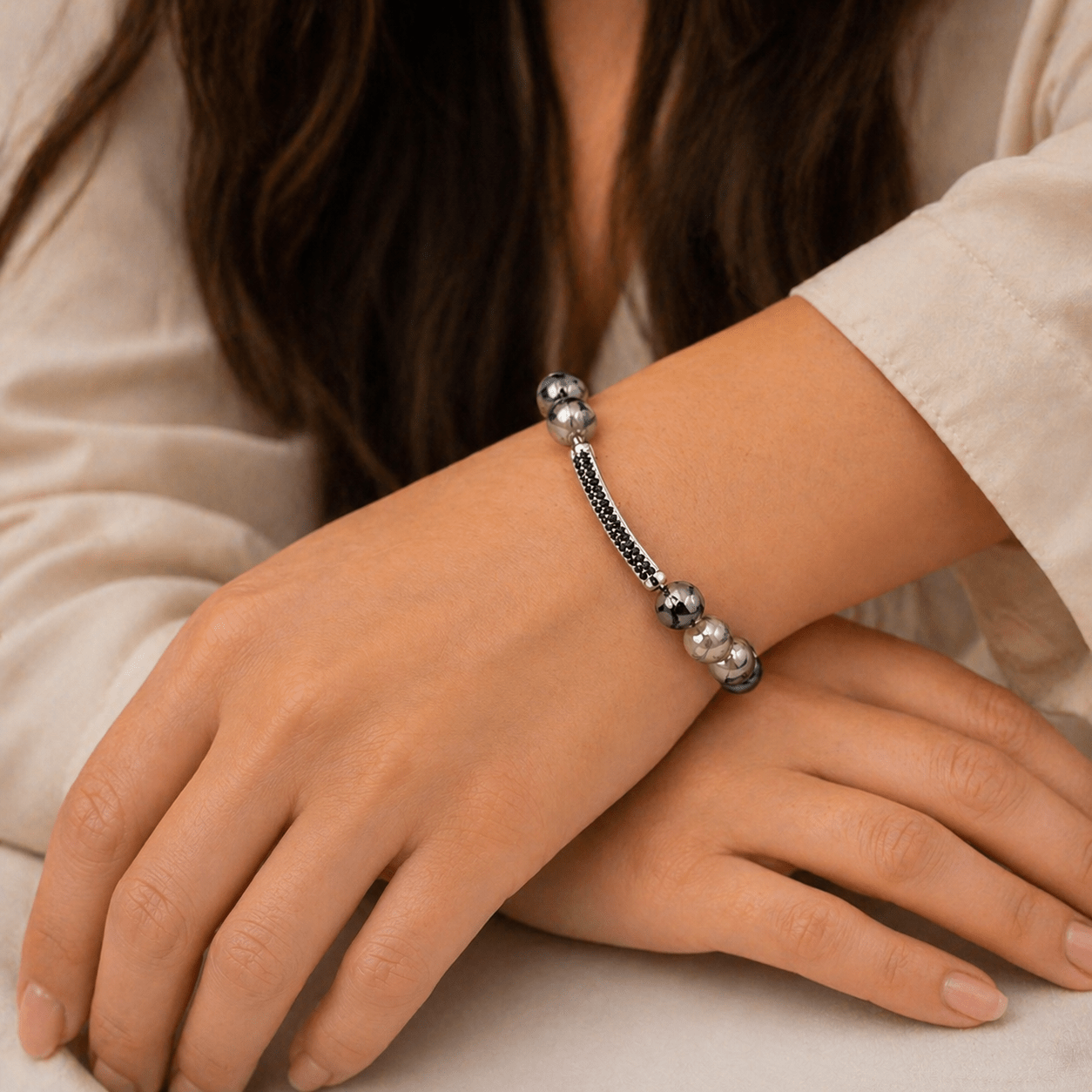 Stone Agate bracelet, on the wrist beside the cuff — stone agate for grounding