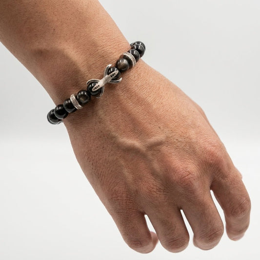 Black Agate bracelet, on the wrist beside the cuff — buy black agate bracelet UAE