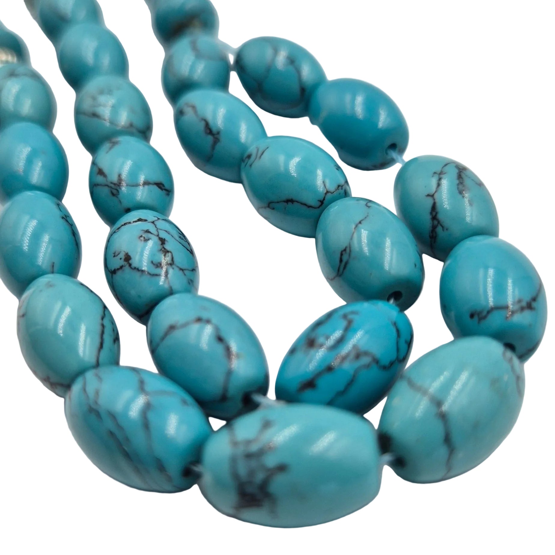 Turquoise beads on a white background