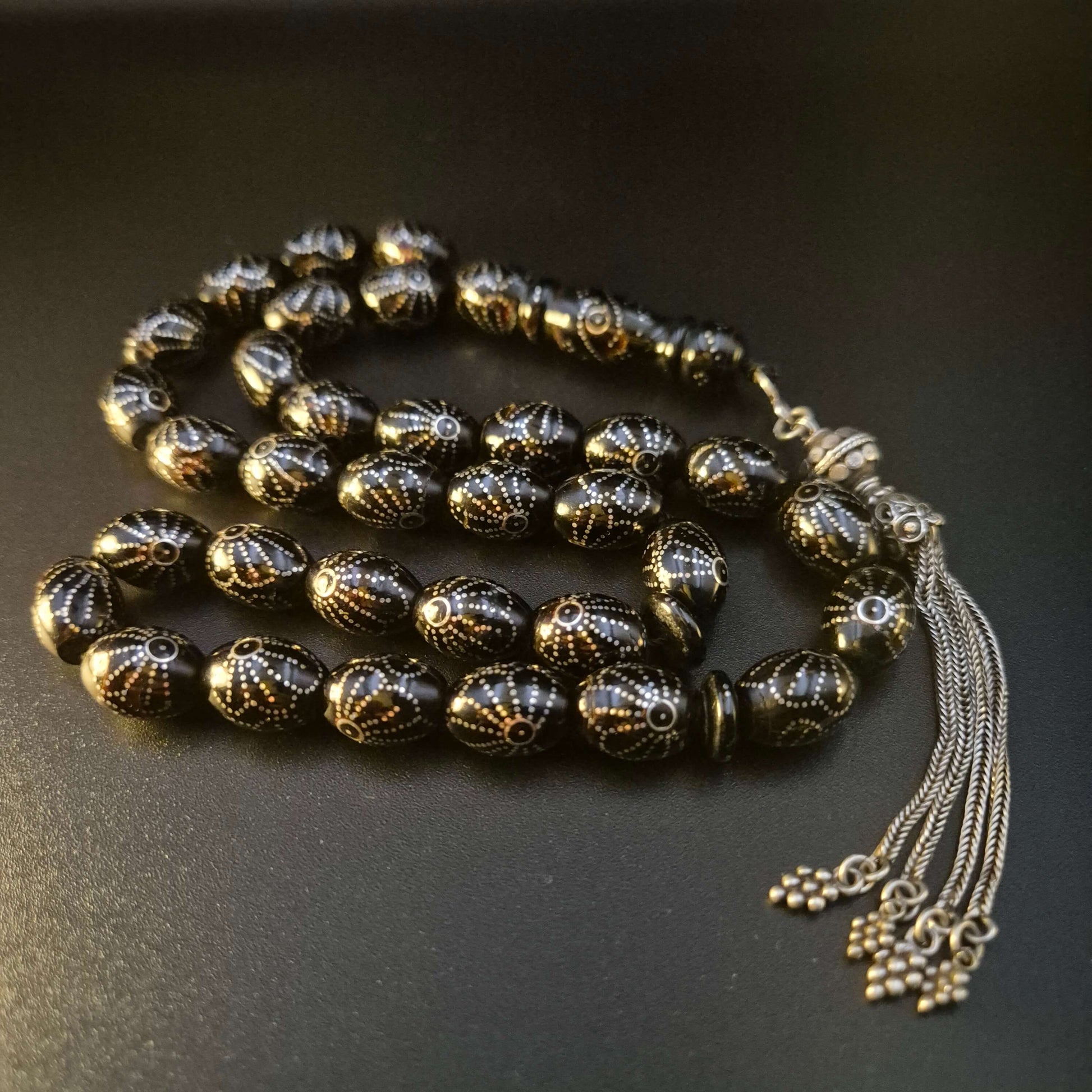 Sunray Yusr tasbeeh, close detail of silver sunray inlay — buy yusur wood beads UAE