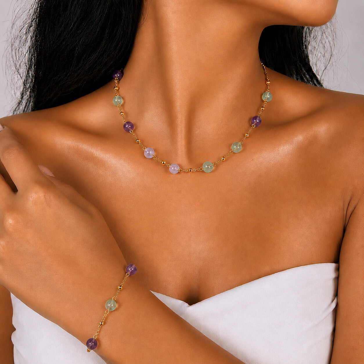 Amazonite gold-plated silver chain necklace and bracelet set, worn on the wrist — amazonite for clarity
