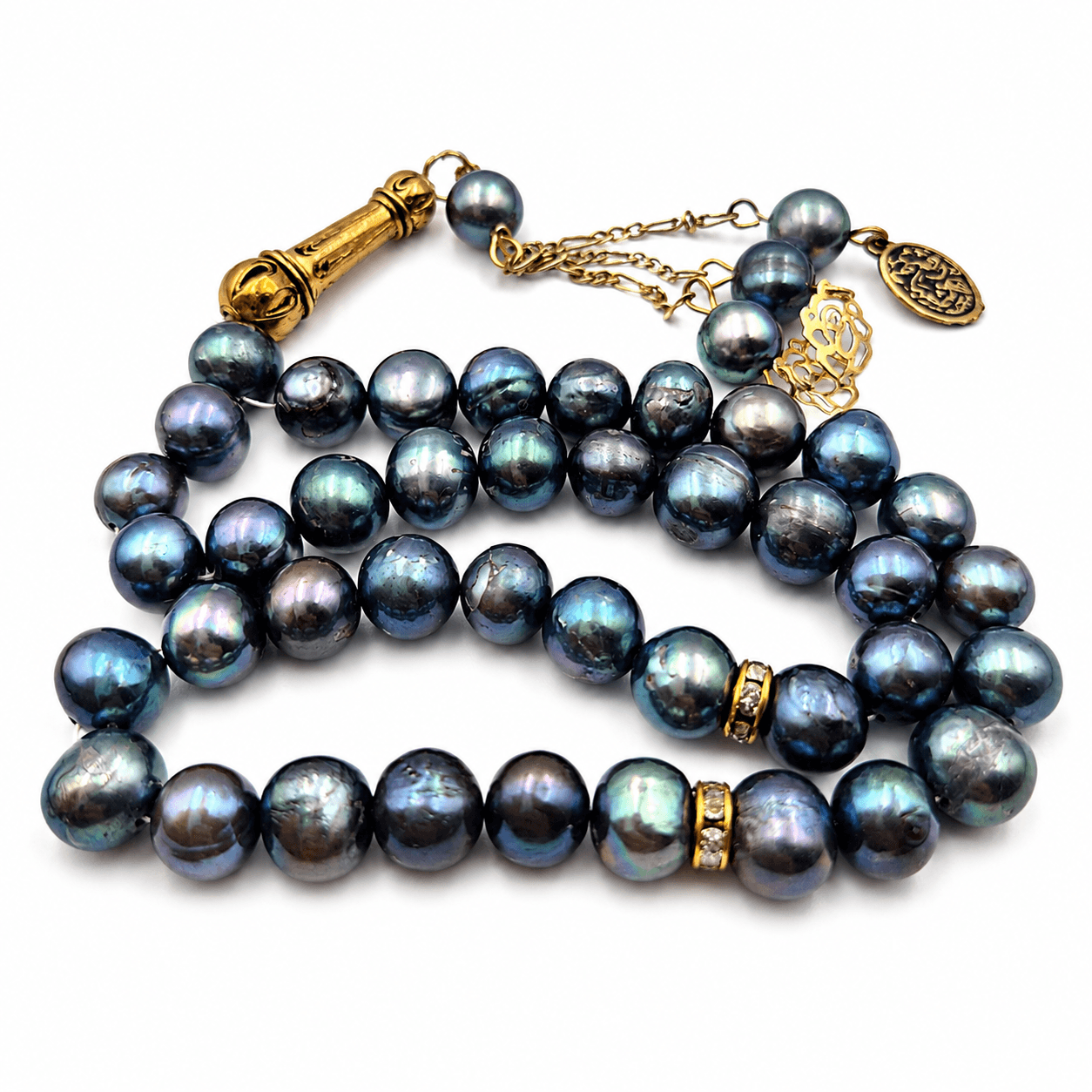 Black Pearl tasbeeh held in hand showing bead size — buy black pearl beads UAE