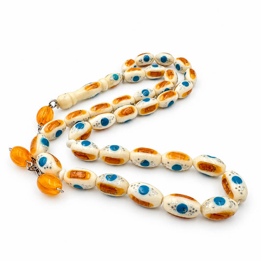 Camel bone misbaha close-up, Fairouz and Miski inlay with silver crafting — luxury sebha UAE