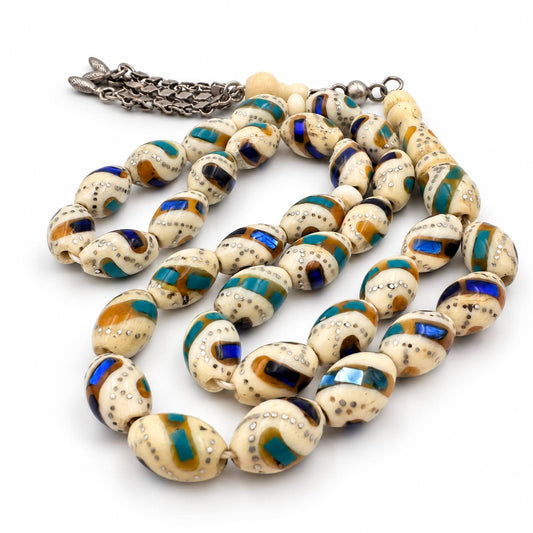 Camel bone misbaha close-up, blue, Fairouz and Miski swirl with silver crafting luxury sebha UAE