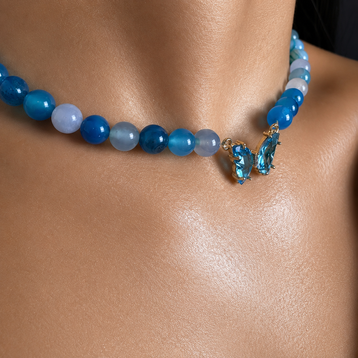  Blue Agate beaded gemstone necklace and bracelet set on white background
