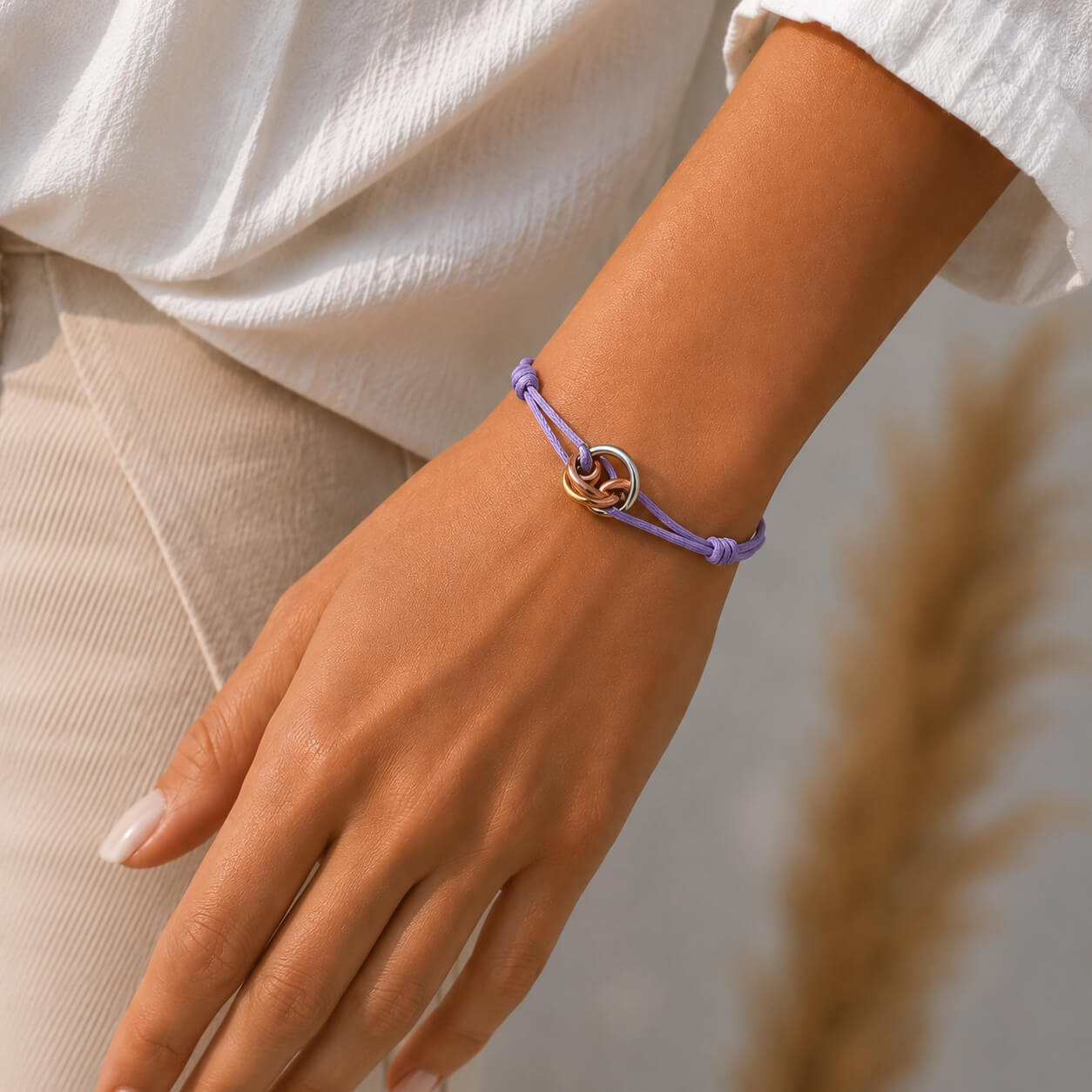 Trilogy Three-Ring adjustable cord bracelet, shown on the wrist — adjustable bracelet for men and women Dubai