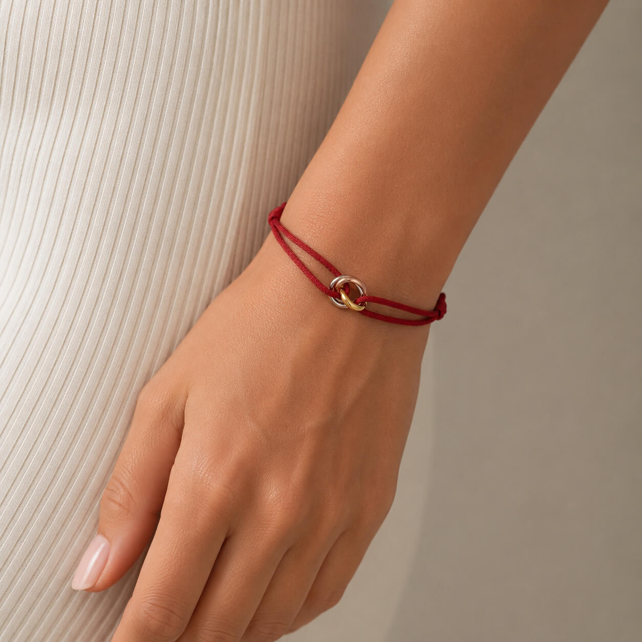 Trilogy Three-Ring adjustable cord bracelet, worn and shown from above — fashion accessory bracelet UAE