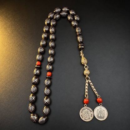 Cartographer Yeser tasbih, 33 beads with crossed silver dot inlay, coral beads and coin tassel — rare yusur misbaha UAE