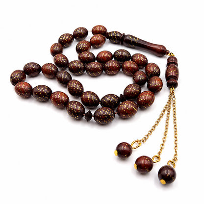 Copper Crafted Narjil tasbih, the tassel knot and chain link in detail — narjil beads