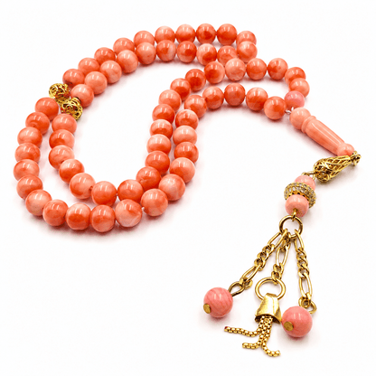 Angel Cheek Natural Coral sebha, close detail of pink coral beads — buy angel cheek natural coral beads UAE