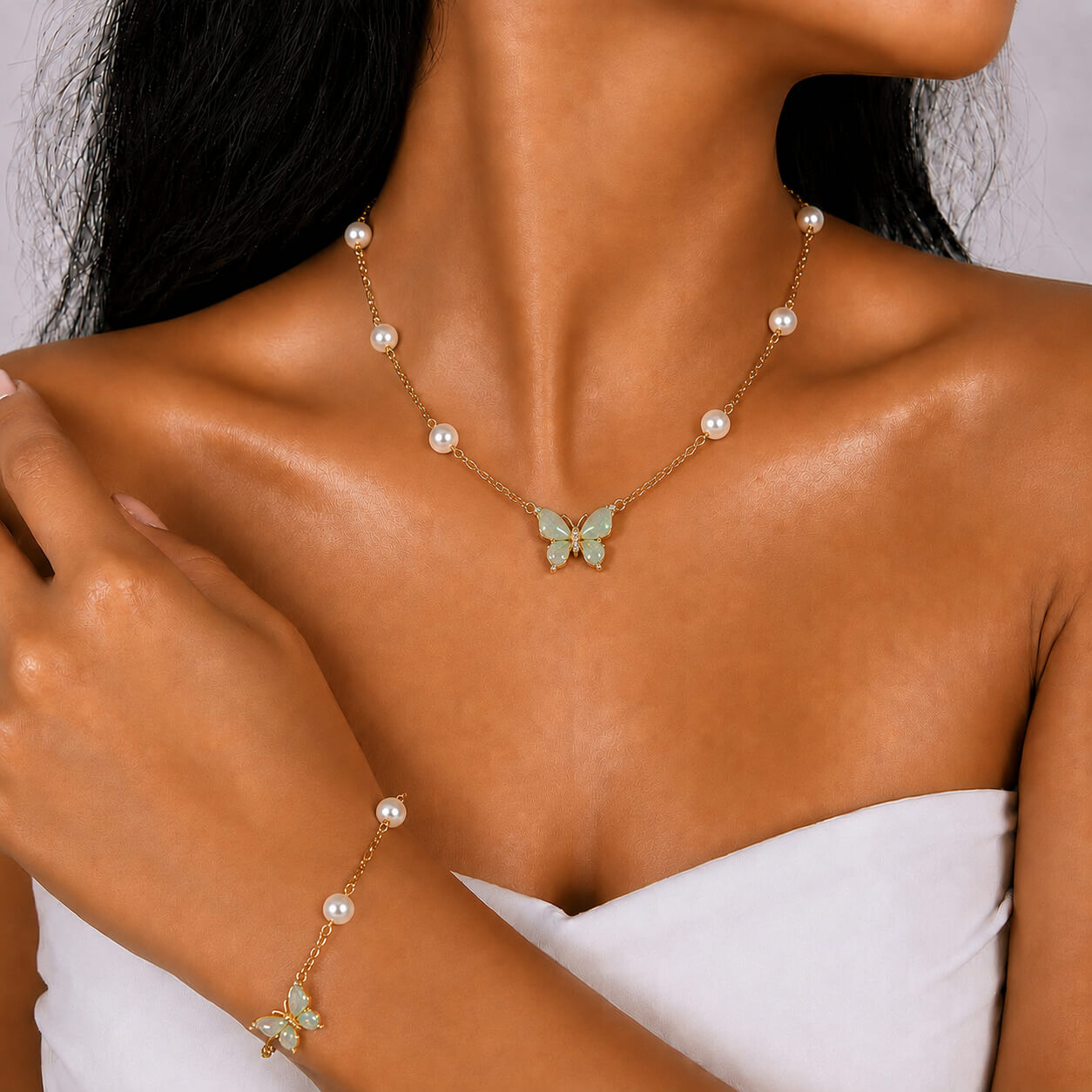 Freshwater Pearl gold-plated silver chain necklace and bracelet set, worn on the wrist — freshwater pearl for confidence