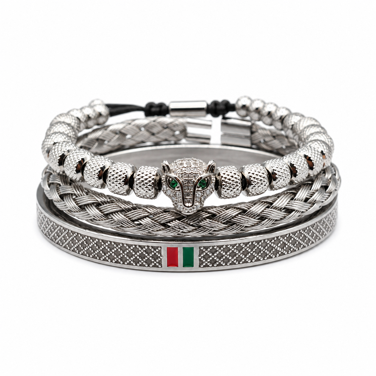 Stack of silver bracelets with a panther head design on a white background