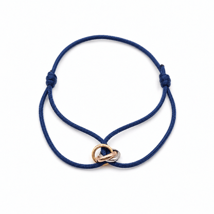 Trilogy Three-Ring adjustable cord bracelet, laid flat on a white background — buy cord bracelet UAE