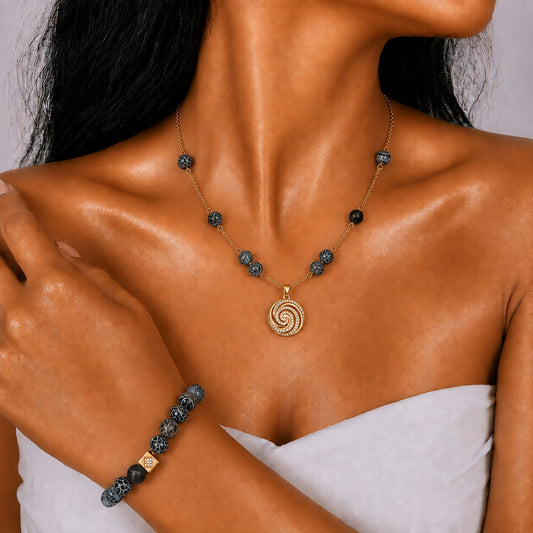 Volcanic Agate gold-plated silver chain necklace and bracelet set, modelled on the wrist — volcanic agate for protection