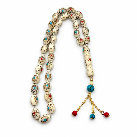 Camel bone mesbah 33 beads with red and Fairouz inlay, gold plated silver tassel. AtiQ & Jade Dubai