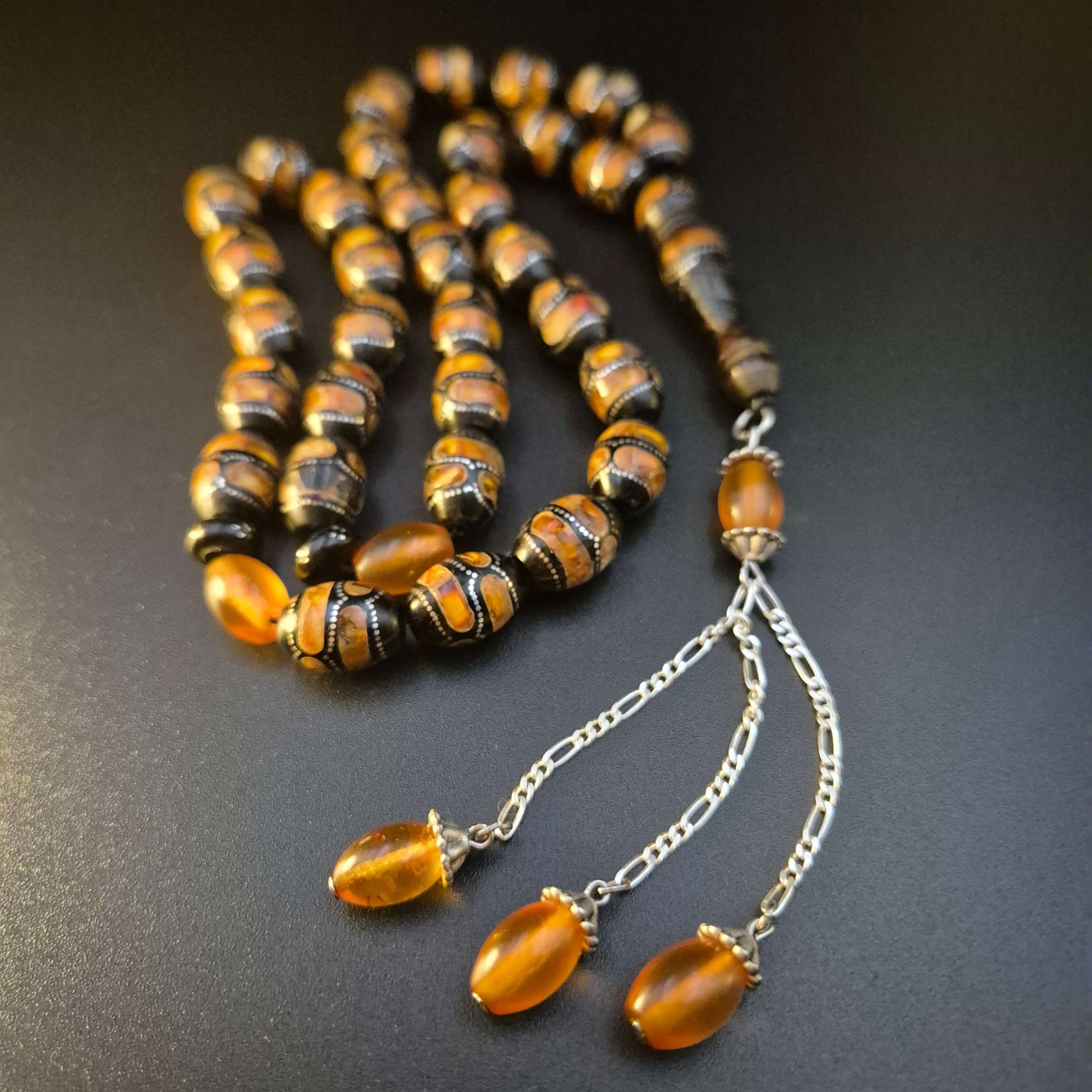 Kahraman Yusur mesbah, detail of the tassel's silver work — rare yeser wood beads