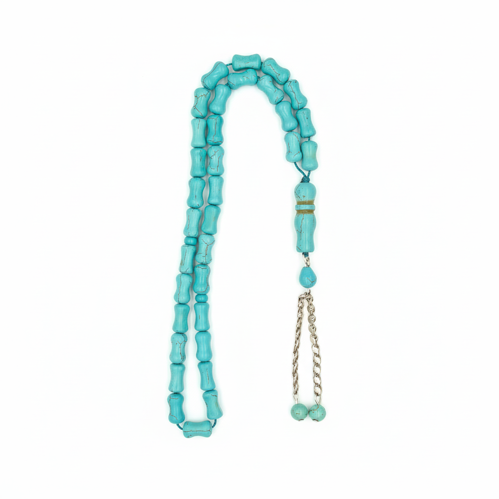 Captivating Azure Essence: A mesmerizing display of vibrant turquoise hues, reminiscent of deep ocean waters, evoking a sense of immediate calm and regal beauty crafted with golden copper and set of silver gold coated.

A celebrated talisman for those born in December, this Fairouz Mesbah resonates deeply with the Sagittarius spirit, offering a grounding energy that encourages truth and safeguards the traveler